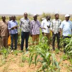 Officials and farmers at the Yabicho A irrigation scheme in Mandera