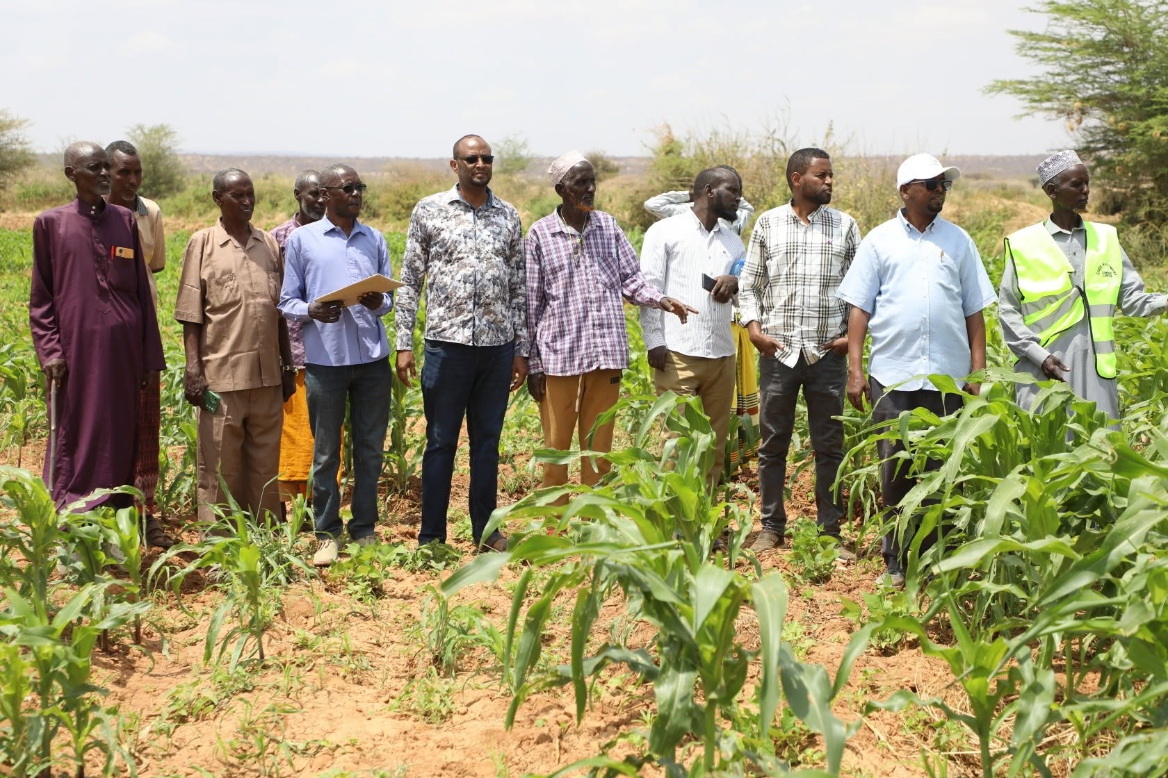Officials and farmers at the Yabicho A irrigation scheme in Mandera